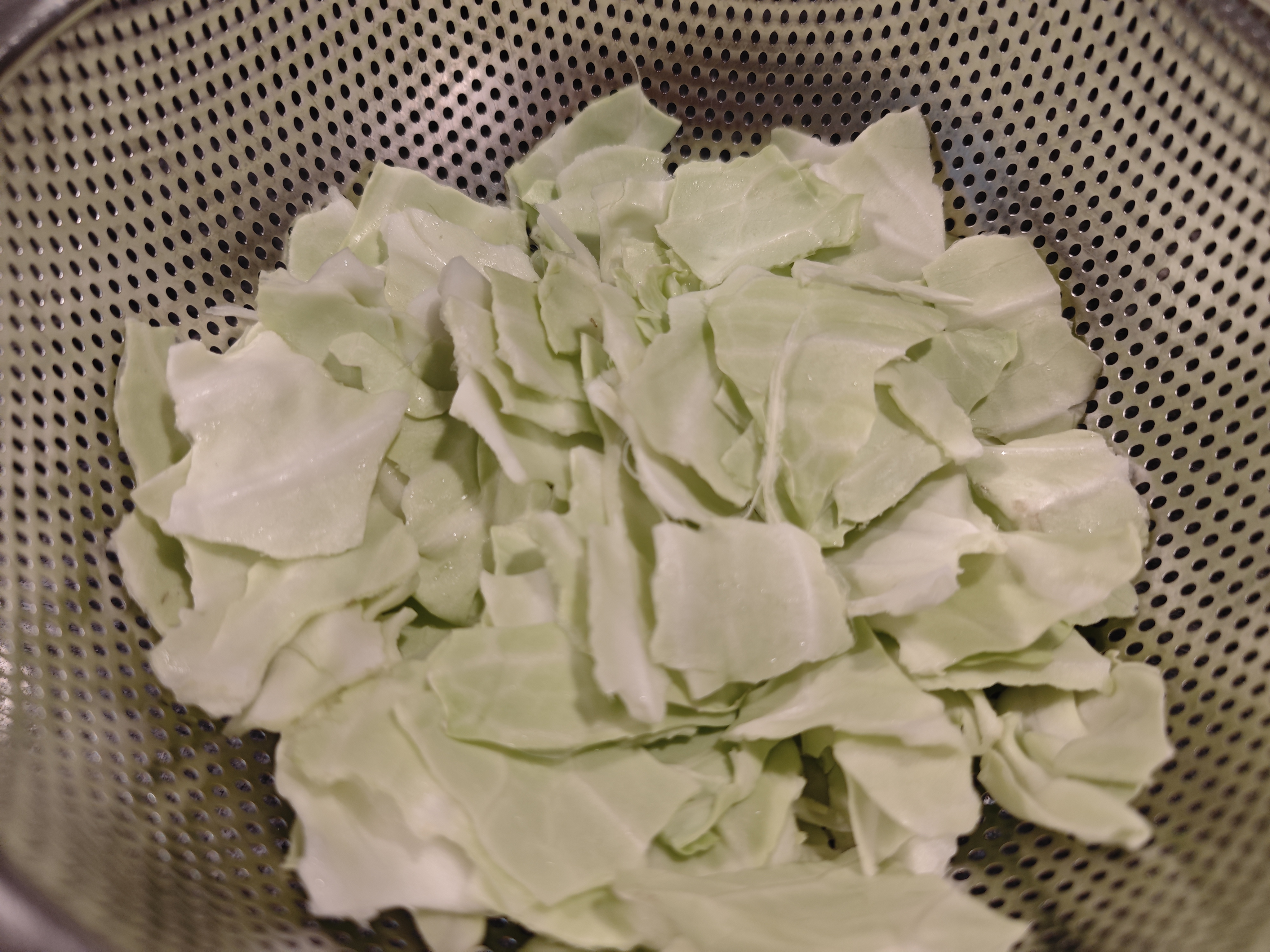 A bowl of shredded cabbage